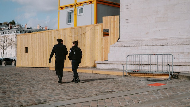 Two security guards patrolling a commercial property