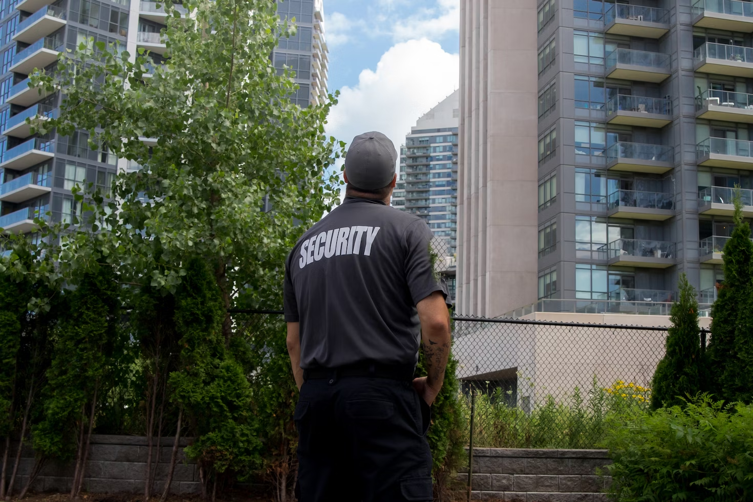 A security guard watching a corporate building 