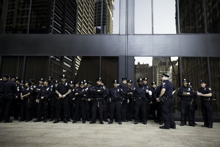 A group of corporate security professionals outside a building