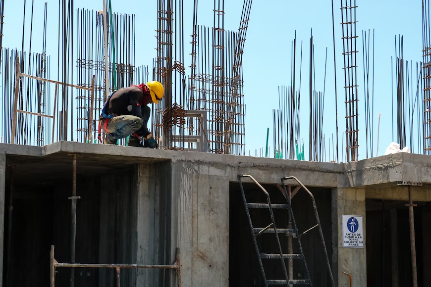 A worker working on a construction building 