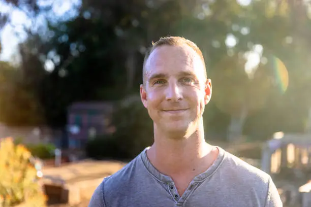 Group of friends volunteering together in a community garden