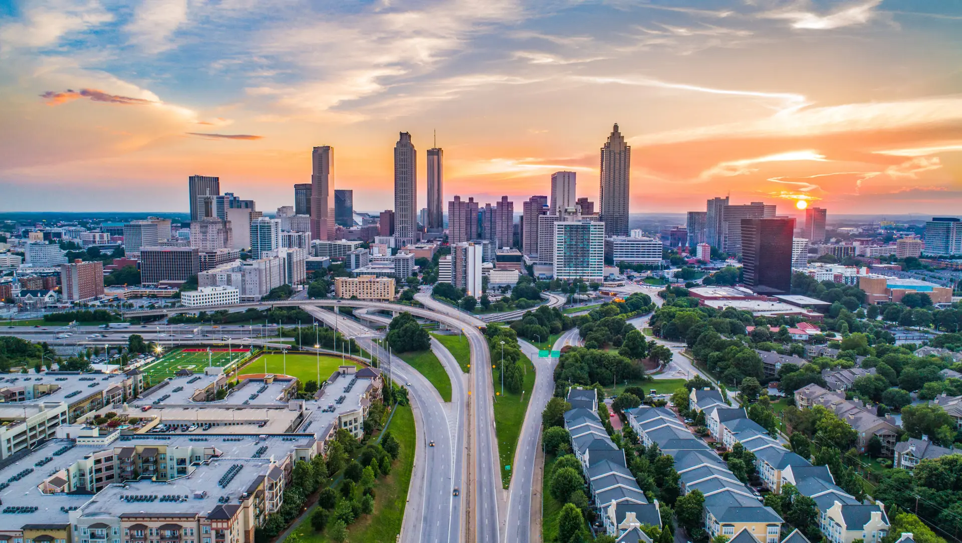 City skyline during sunset with highways